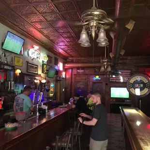 a man standing at the bar