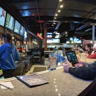 a man sitting at the bar