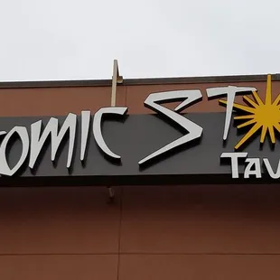 the atomic star tavern sign