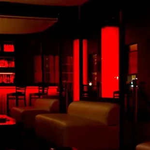 a bar with red lights