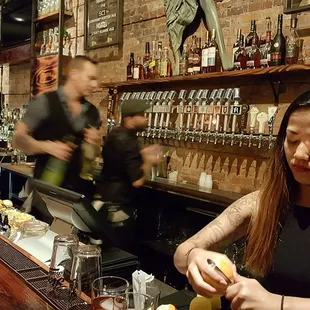 a woman sitting at a bar