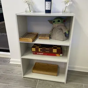 Board Games for customers to play with &amp; cute Baby Yoda!