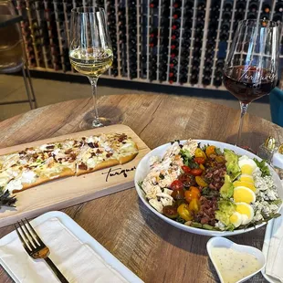 Flat bread and salad.  Also had several other items - including the famous Champagne Cupcake but ate them before took pic!