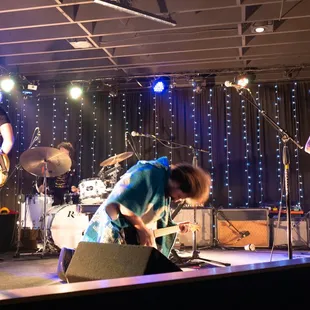 a band performing on stage