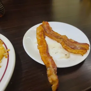 bacon and eggs on a plate