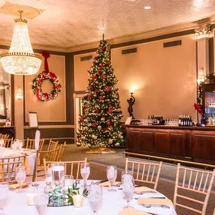 the dining room decorated for christmas