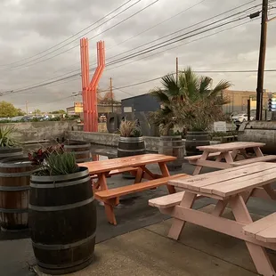 a picnic table and barrels