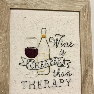 a picture of a wine bottle and a glass