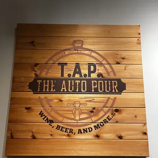 a wooden sign on the wall