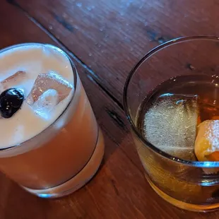 a drink and an orange slice
