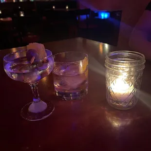 Vodka martini with olive/twist and mezcal old fashioned
