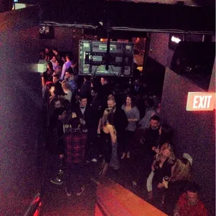 a crowd of people at a party
