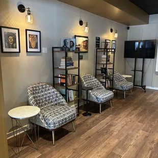 Upstairs seating area with books to read