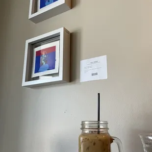 The Avenue latte iced and some beautiful local art.