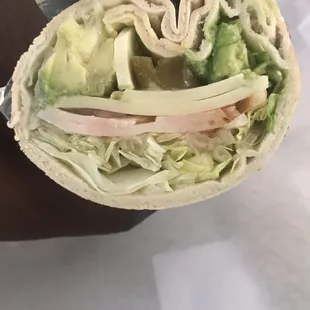 It should be called a lettuce wrap with a sprinkle of turkey and cheese...