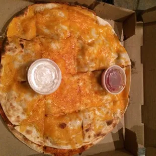 Got the buffalo chicken quesadilla and it is HUGE!!! Definitely didn&apos;t short on the chicken either!