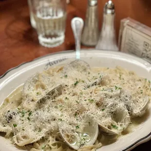 a plate of pasta with clams