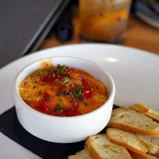 a plate of bread and dip