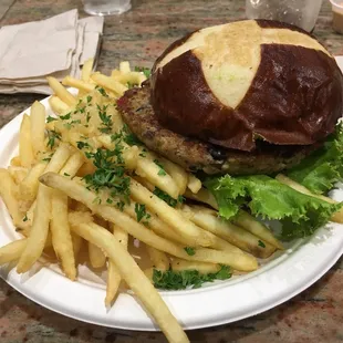 Nomsss (pretzel bread and garlic fries are a must)