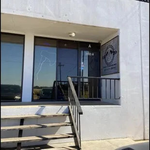 Front entrance in warehouse on left just past Whataburger on houston hwy.