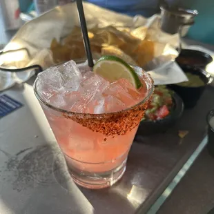 Watermelon margarita and chips and guacamole