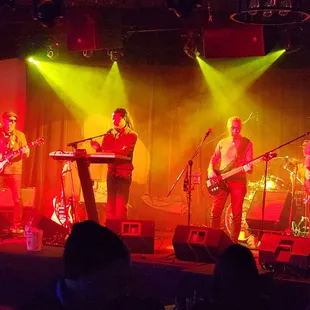 a band performing on stage