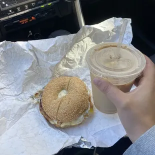 Sunrise bagel on sesame bagel and sausage with a 16 oz latte