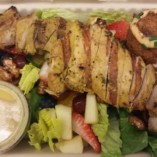 Grilled chicken salad &amp; a crunch saffron rice ball.