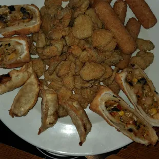 The 4-Sampler...Pot stickers, Mozzarella Sticks, Southwest EggRolls, Fried Pickles