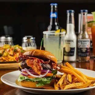 a burger and fries on a table
