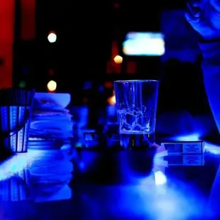 a person sitting at a bar