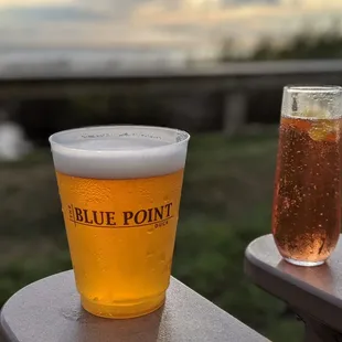 a glass of beer and a glass of wine