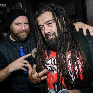 two men posing for a picture