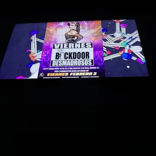 a black background with a neon sign