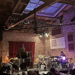 a band playing on stage