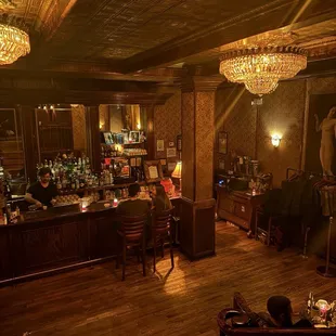 a bar with a chandelier