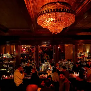 people sitting at the bar