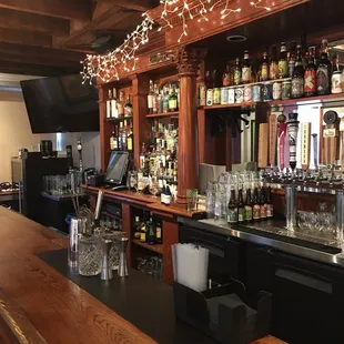 a bar with a lot of bottles
