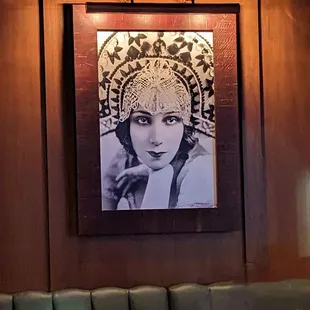 a portrait of a woman in a headdress