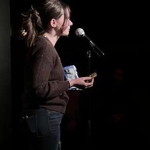 A standup competition (Wrenches Thrown) where Bree Kalhorn has to eat an entire bag of chips while doing her 2 minute set