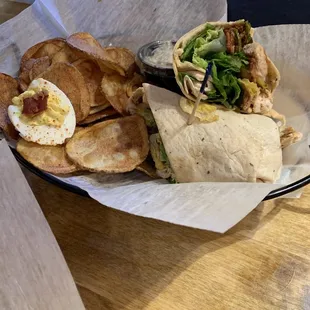 Chicken Brussel Sprout Wrap, house made chips and crafted French onion dip, and a deviled egg