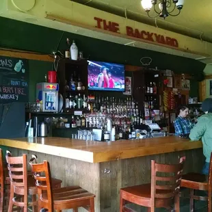 people sitting at a bar