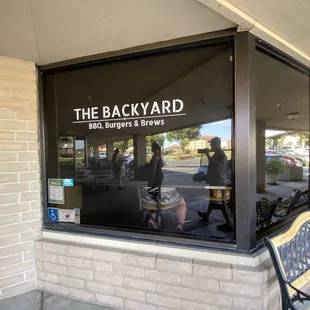 a bench outside of a restaurant