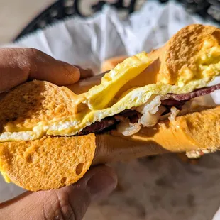 Green chile bagel with bacon, egg and cheese