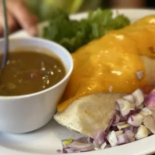 Daughter got the chicken burrito with green chili on the side.  Would not order again.