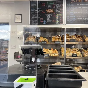 Front counter where you pay, pick out fresh bagels