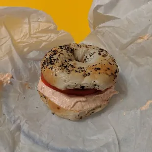 Everything bagel, lox spread, tomato, toasted