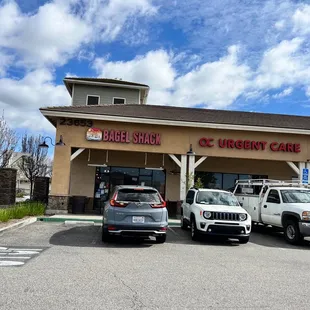 three jeeps parked in front of the store