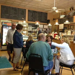 a group of people sitting at a table