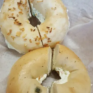 Onion bagel with Garlic Herb cream cheese and Veggie bagel with Veggie cream cheese